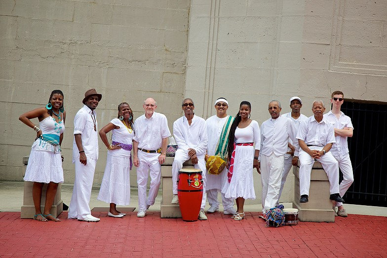 Kevin Davis and the Ban Caribe ensemble in white clothing